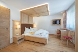 Postel nebo postele na pokoji v ubytování Hotel Theiner