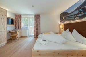 Postel nebo postele na pokoji v ubytování Hotel Theiner