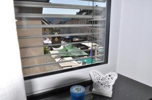 a window with a view of a city at Apartman Benjo in Hermagor
