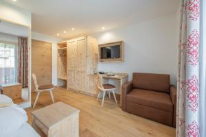 TV a/nebo společenská místnost v ubytování Hotel Theiner