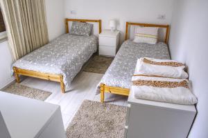 Cama o camas de una habitación en casa das pombas