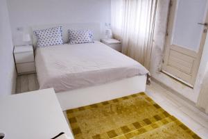 Cama o camas de una habitación en casa das pombas