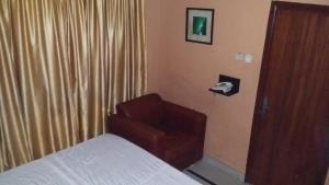 Llit o llits en una habitació de JCB Hotel
