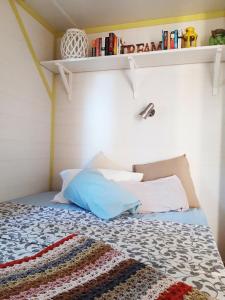 A bed or beds in a room at The PineForest Cabin