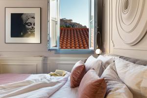A77 Suites, Small Luxury Hotels of the World客房内的一张或多张床位