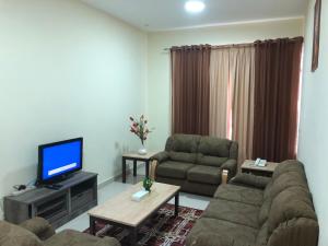 Posezení v ubytování Al Khaleej Plaza Furnished Apartments LLC