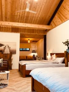 Postel nebo postele na pokoji v ubytování Grace House Homestay 2