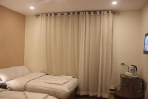 Rúm í herbergi á Farida Pyramids Boutique Hotel