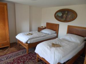 Ένα ή περισσότερα κρεβάτια σε δωμάτιο στο Ubytování U babičky
