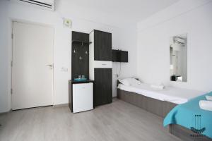 Postel nebo postele na pokoji v ubytování Regency Villa