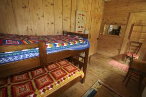 Postel nebo postele na pokoji v ubytování Riversong Centre Thermal