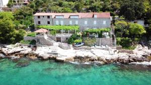 an aerial view of a house on the water at Sea of Eden in Dubrovnik