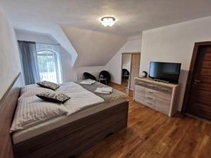 Postel nebo postele na pokoji v ubytování Zamoček + 37 fotografií