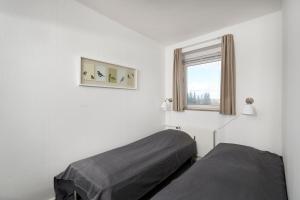 Postel nebo postele na pokoji v ubytování Hotel-B
