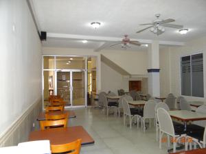Veitingastaður eða matsölustaður á Hotel Mac Arthur