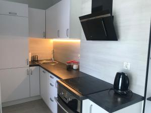 Kuchyňa alebo kuchynka v ubytovaní Apartament Lucky