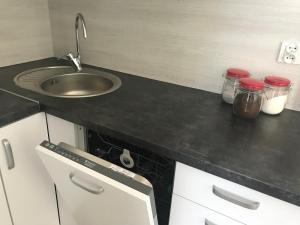 Kuchyňa alebo kuchynka v ubytovaní Apartament Lucky