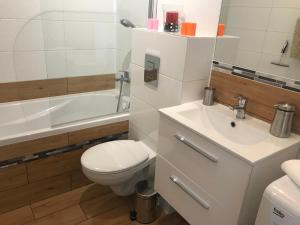 Kúpeľňa v ubytovaní Apartament Lucky