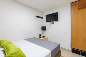 TV a/nebo společenská místnost v ubytování Hotel Colombia Avenida + 29 fotografií