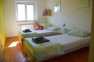 Apartments Peter & Free parkingにあるベッド