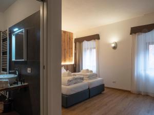 Postel nebo postele na pokoji v ubytování Valtempo Relais