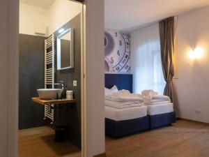 Postel nebo postele na pokoji v ubytování Valtempo Relais