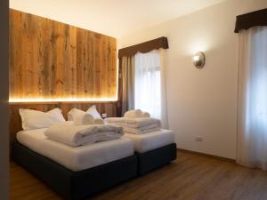 Postel nebo postele na pokoji v ubytování Valtempo Relais