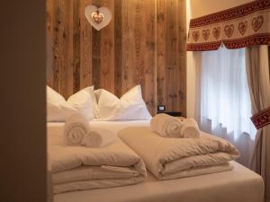 Postel nebo postele na pokoji v ubytování Valtempo Relais