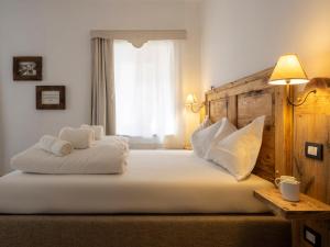 Postel nebo postele na pokoji v ubytování Valtempo Relais