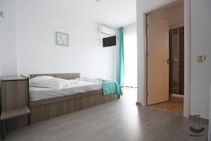 Postel nebo postele na pokoji v ubytování Regency Villa