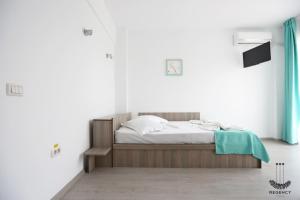 Postel nebo postele na pokoji v ubytování Regency Villa