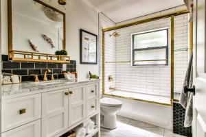 a bathroom with a sink and a toilet at Island View Cottages Sebastian in Sebastian