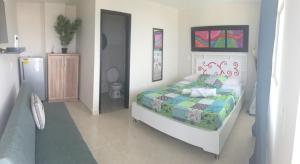 Voodi või voodid majutusasutuse Caribbean Island Hotel toas