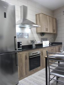 Kuchyň nebo kuchyňský kout v ubytování Yanez Sweet Home Valsequillo de GC