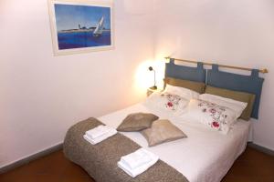 Ein Bett oder Betten in einem Zimmer der Unterkunft Romantico Balcone in Centro