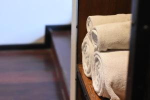Postel nebo postele na pokoji v ubytování Cacha Hotel