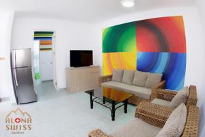 TV a/nebo společenská místnost v ubytování Alona Swiss Resort