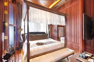 Postel nebo postele na pokoji v ubytování Aksorn Rayong, The Vitality Collection - SHA PLUS