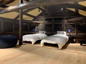 Krevet ili kreveti u jedinici u okviru objekta The Ninja Mansion
