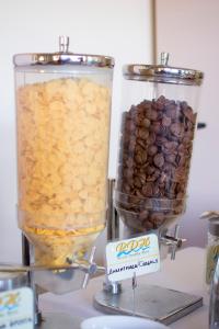 two blenders with food in them on a counter at Riviera Perdika Hotel in Perdika