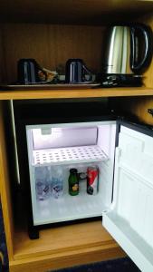 Kuchyň nebo kuchyňský kout v ubytování Hotel Mastai