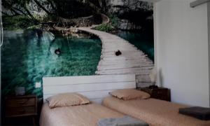 Postel nebo postele na pokoji v ubytování Chambre La Caunette
