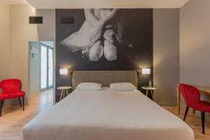 Un ou plusieurs lits dans un hébergement de l'établissement Ibis Styles Toulouse Capitole
