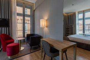 Coin salon dans l'établissement Ibis Styles Toulouse Capitole