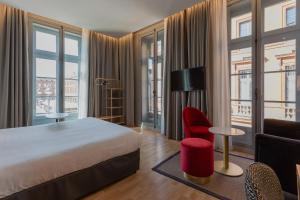 Un ou plusieurs lits dans un hébergement de l'établissement Ibis Styles Toulouse Capitole