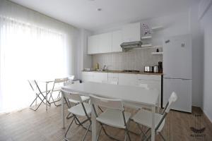 Kuchyň nebo kuchyňský kout v ubytování Regency Villa