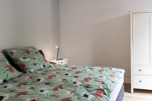 Postel nebo postele na pokoji v ubytování Ferienwohnung am Wall