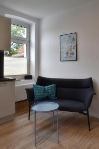 Posezení v ubytování Ferienwohnung am Wall