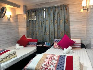 夢鄉賓館房間的床 +19 張相片