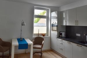 Kuchyň nebo kuchyňský kout v ubytování Ferienwohnung am Wall